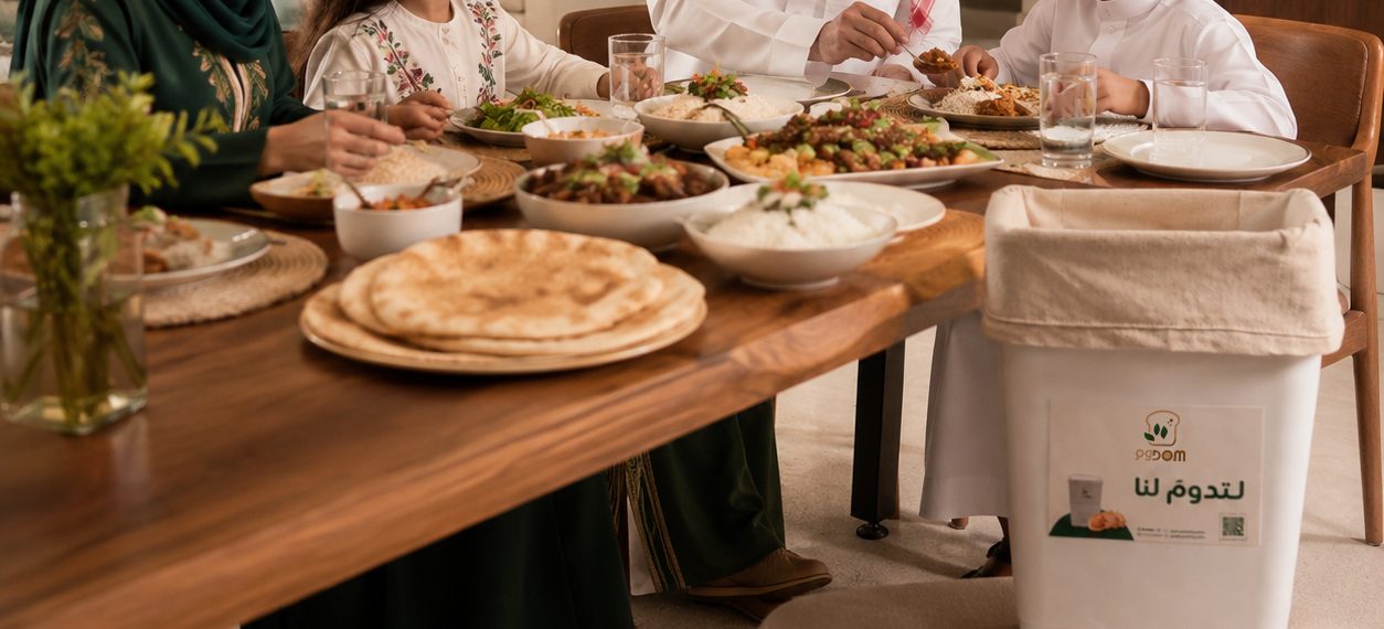 A family dinner table with bread and the DOM bread container
